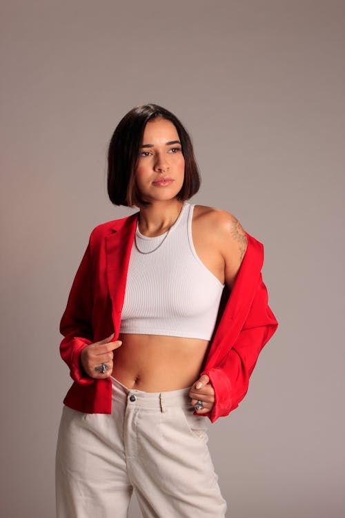 Woman in Red Blazer and White Tank Top Posing · Free Stock Photo