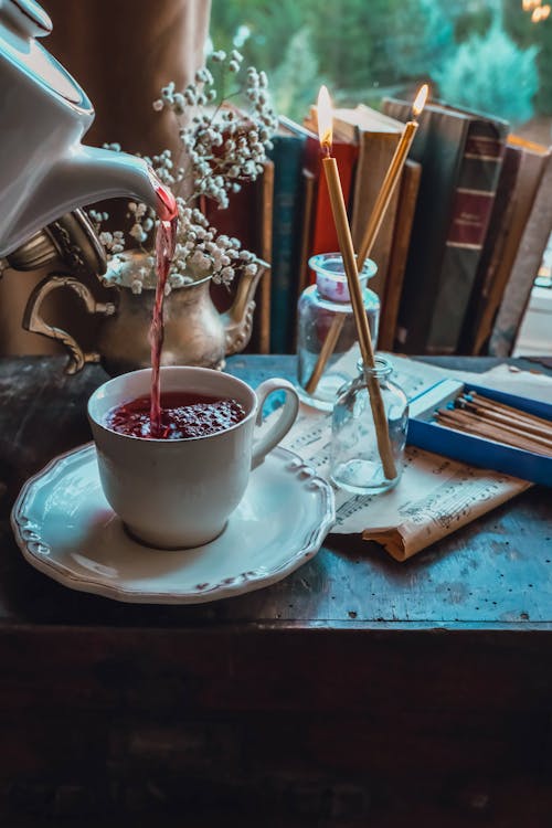 Pouring Fruit Tea into a Cup