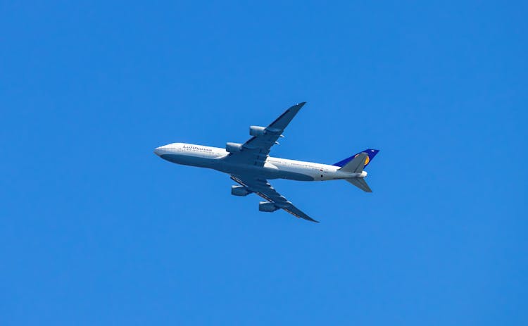 An Airplane In The Blue Sky 