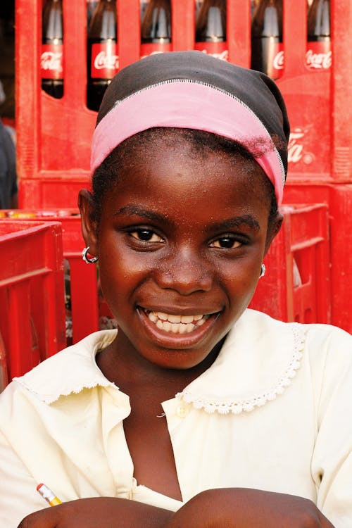 Girl in Yellow Shirt and Pink Bandana