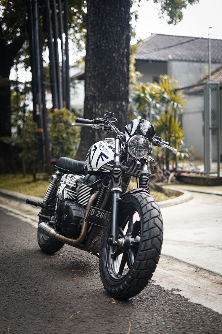 A Motorcycle Parked On The Road