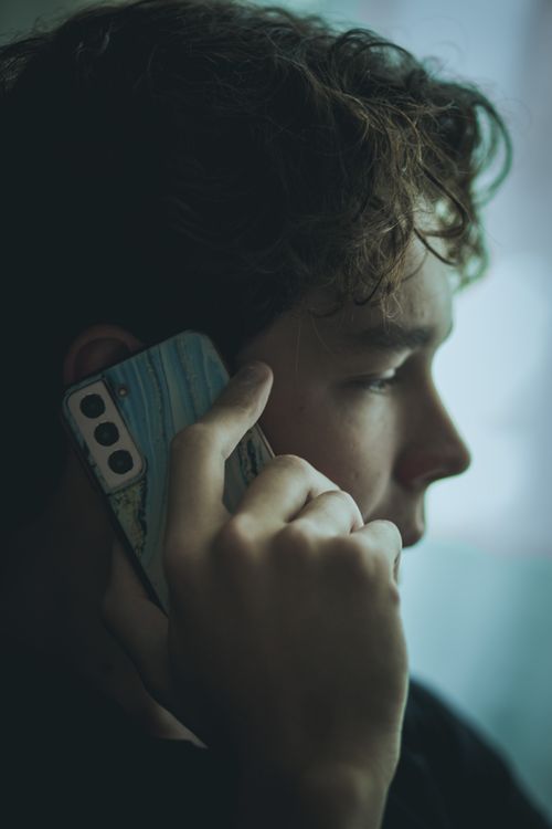 Phone Call Shot Close-Up Shot of a Man on a Phone Call · Free Stock Photo