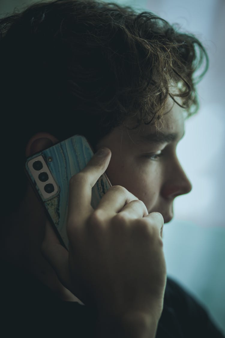 Close-Up Shot Of A Man On A Phone Call