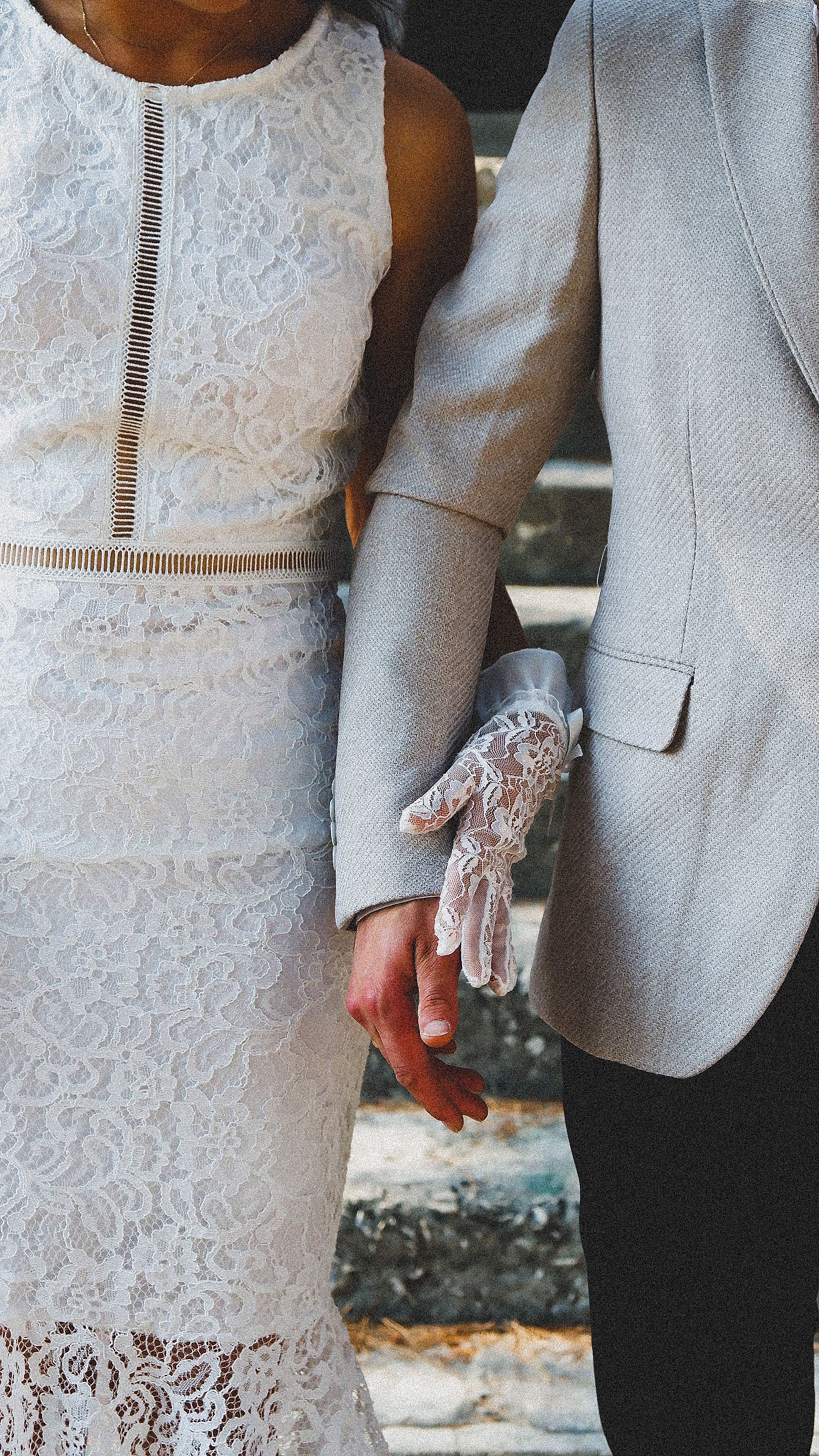 Close-up of a couple in elegant wedding attire, captured in Antalya, Türkiye's picturesque setting.