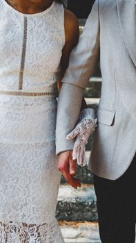Close-up of a couple in elegant wedding attire, captured in Antalya, Türkiye's picturesque setting.