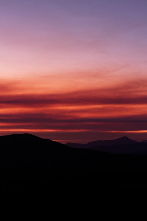 Foto profissional grátis de crepúsculo, Hora dourada, montanhas