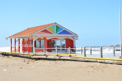 Colorful Building on a Pier on the Seashore 