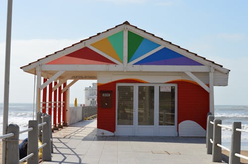 Colorful Building on a Pier on the Seashore 