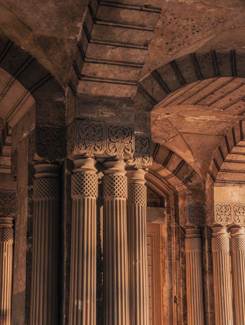 Intricate columns in a historic Istanbul interior showcasing beautiful ornamental details.