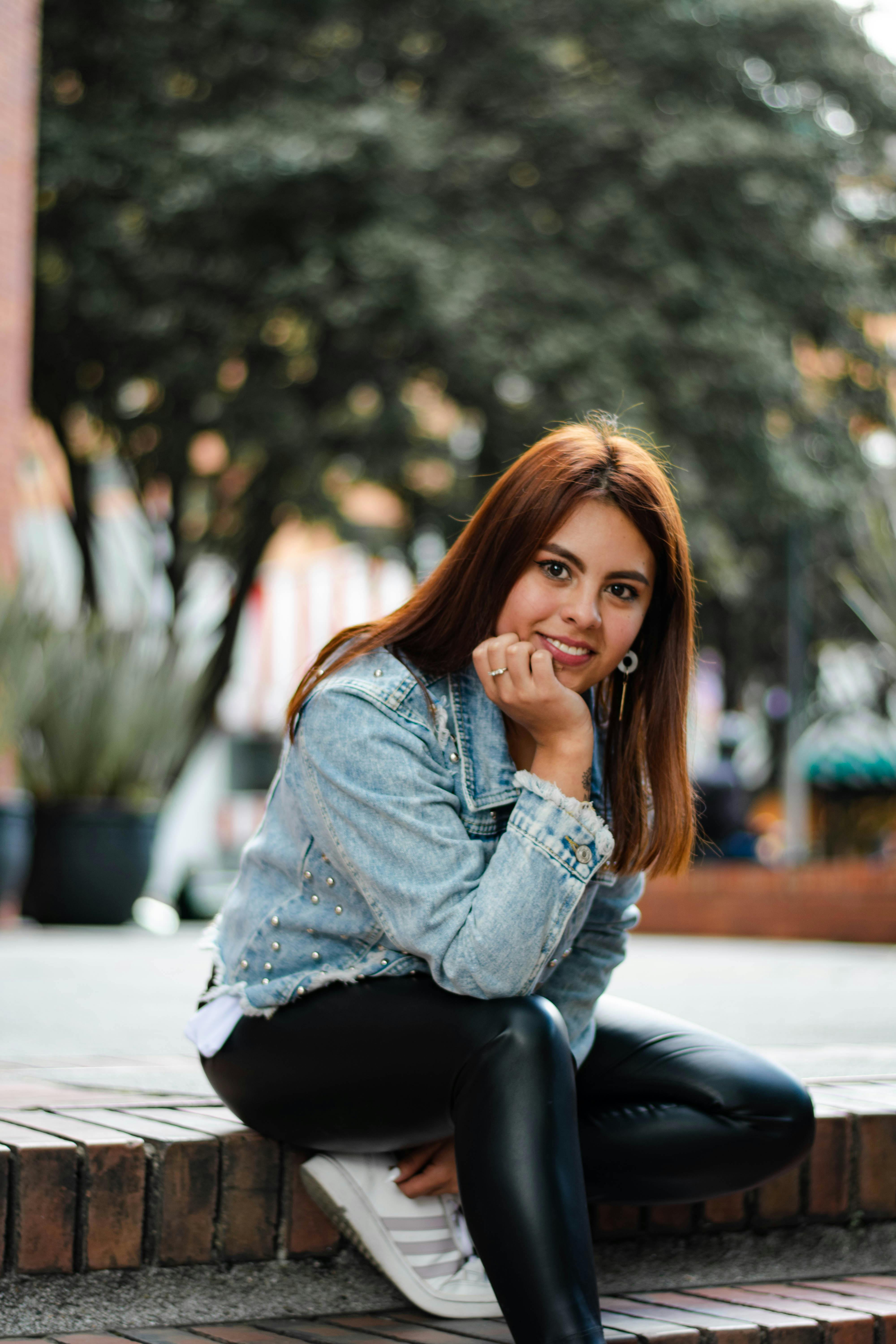 Woman in jeans pants posing Stock Photo by ©Voyagerix 86889924