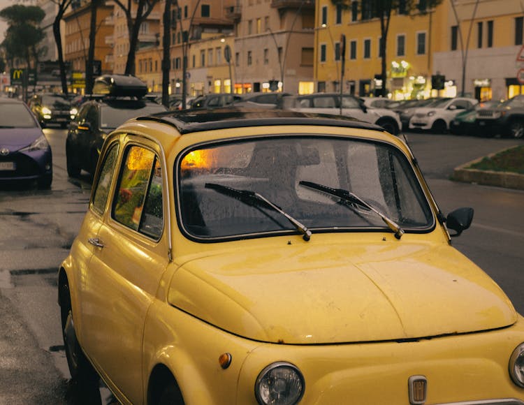 Yellow Fiat On The Road