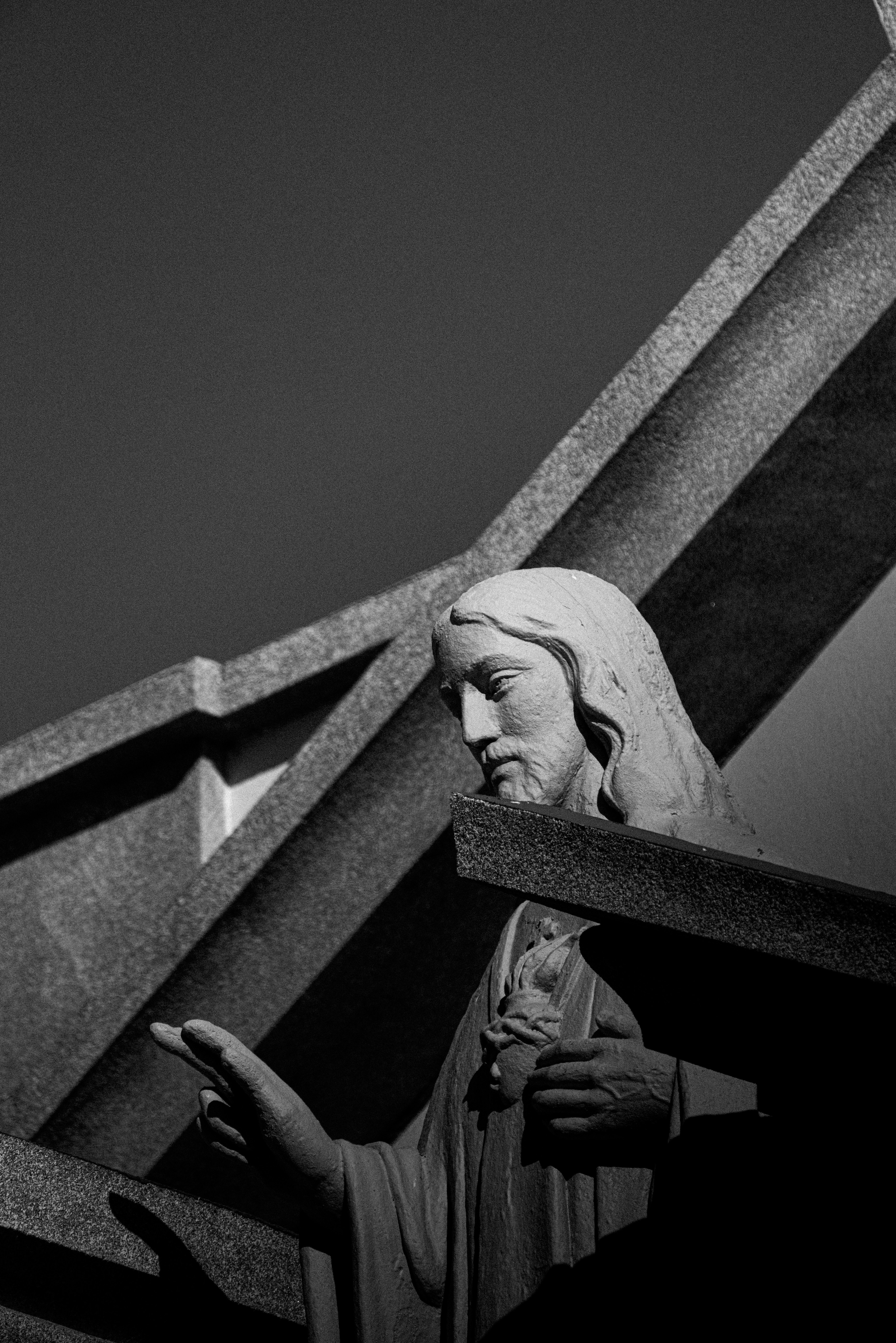 Thoughtfully crafted statue with dramatic lighting