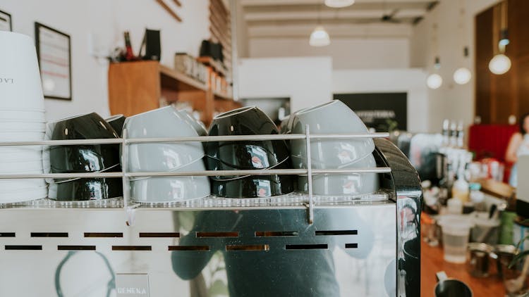 Ceramic Cups On Steel Rack