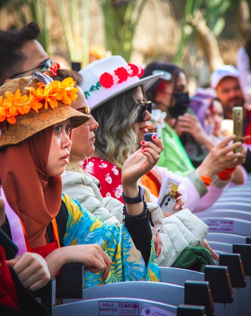 Crowd in Colorful Clothing at a Festival 