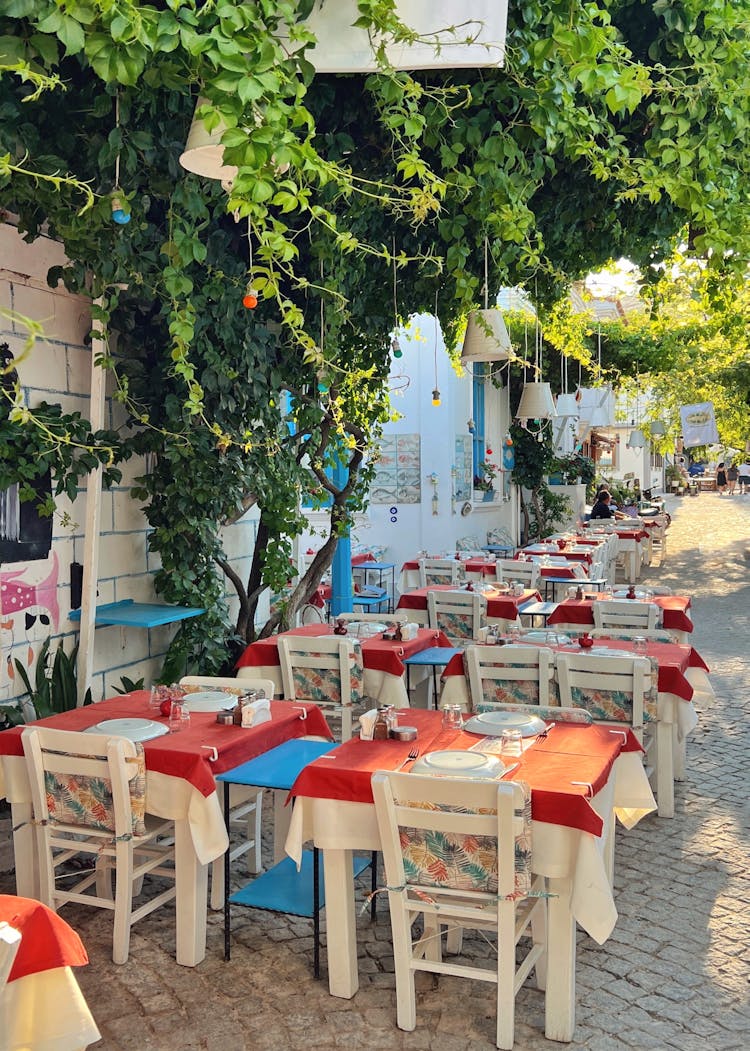 Restaurant Seats And Tables On Street