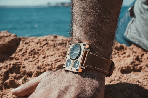 Photo of Person Wearing a Wristwatch