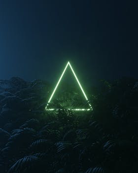 A glowing neon triangle illuminates a dark, mystical forest at night.