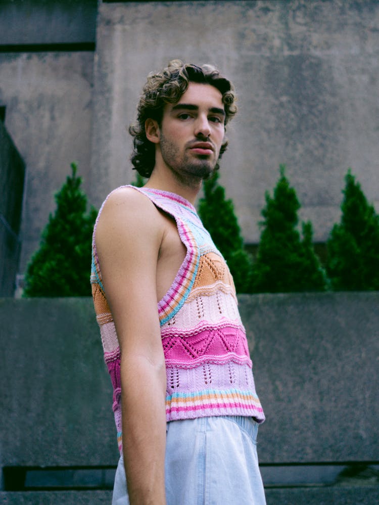 Man In Pink And Orange Knitwear