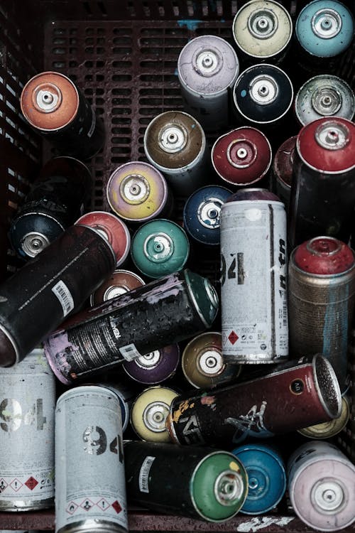 Free Top View of a Variety of Spray Cans Stock Photo