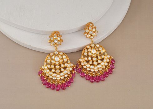 An Earring with Diamond Studs in Close-up Photography