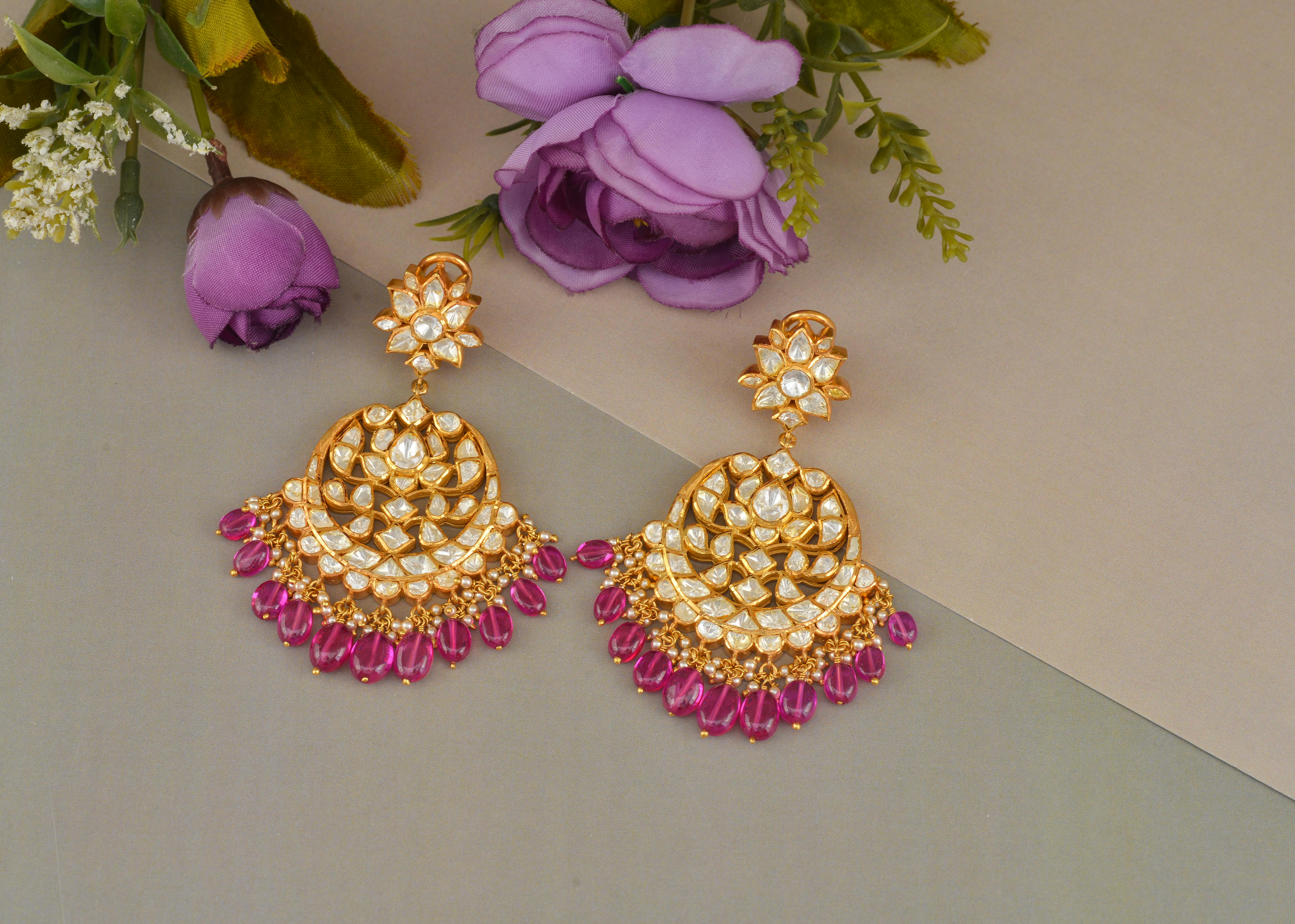 gold and pink jewelries