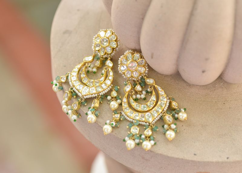 Chandelier jhumka earrings in 22K gold with fine filigree detail