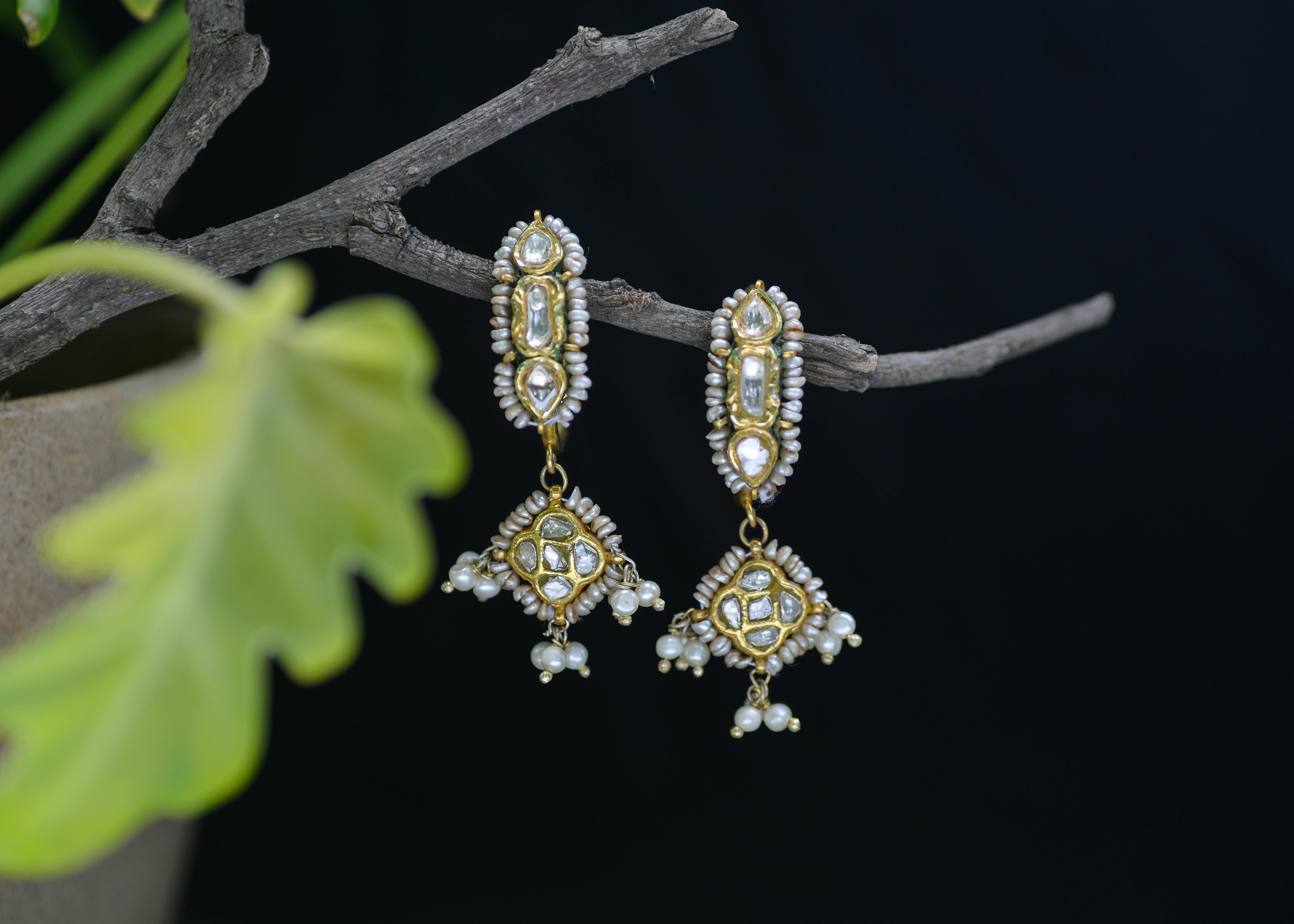 gold and diamond studded earrings