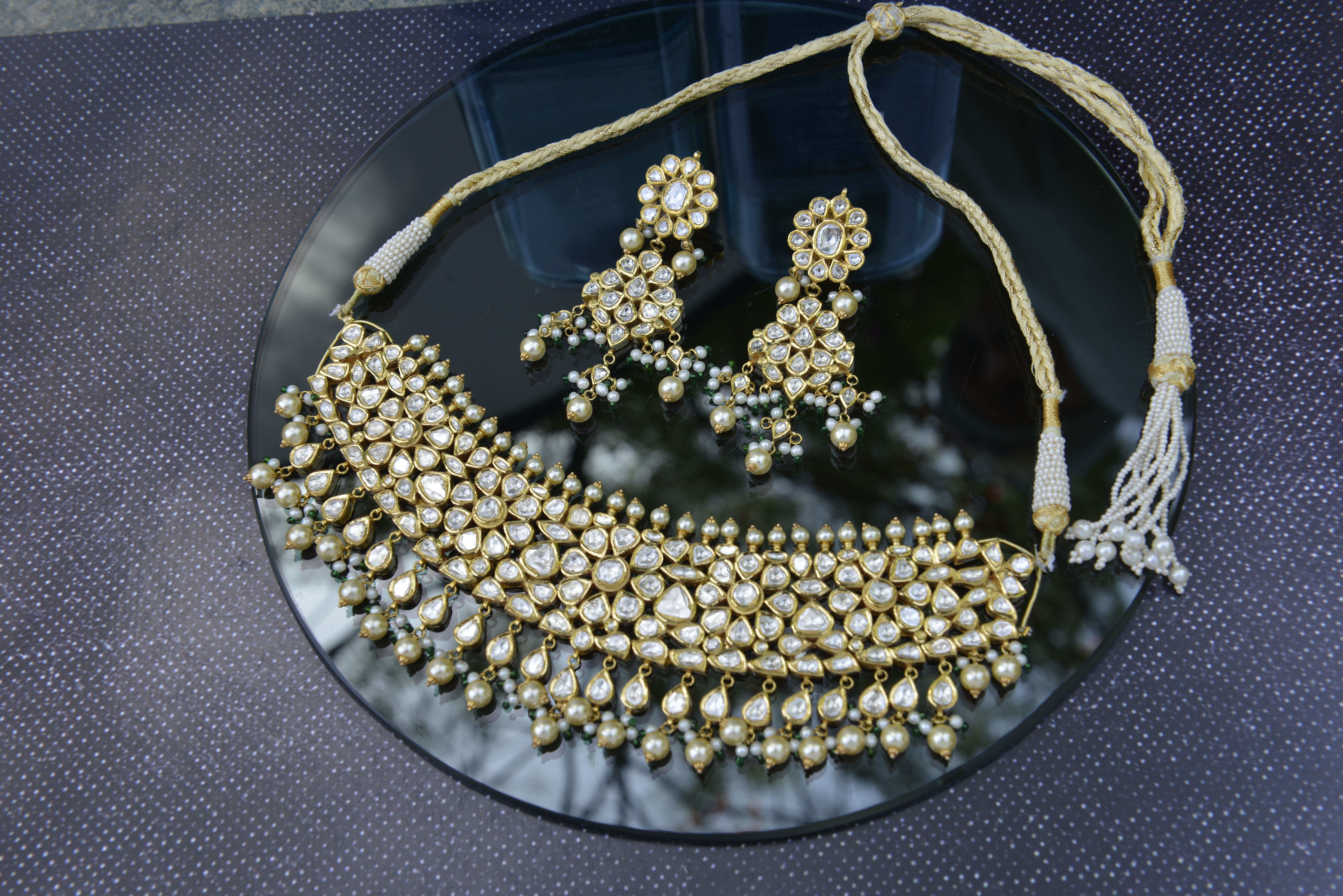 Exquisite Kundan jewelry set with necklace and earrings