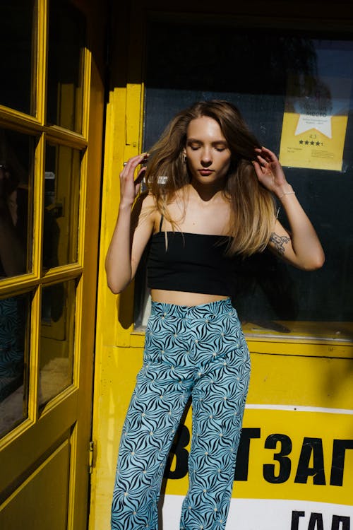 Woman in Black Crop Top and Pants
