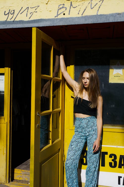 Photo of a Woman Wearing a Black Crop Top