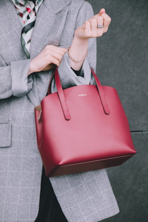 Woman with Elegant Red Bag