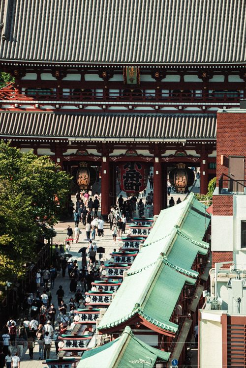 Free A bustling scene at the famous Sensoji Temple in Tokyo, showcasing vibrant architecture and daily life. Stock Photo