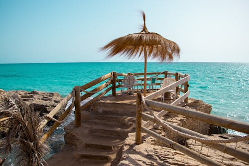 Photos gratuites de balustrade en bois, bord de mer, cabane nipa