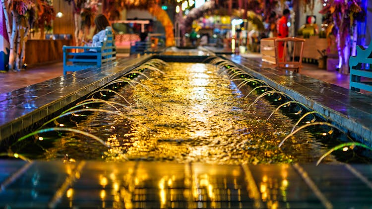 Light On Fountain Water At Night