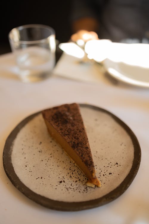 Brown Pie on White Ceramic Plate