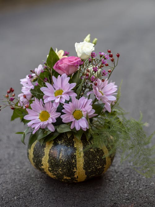 Flower Bouquet on Top of a Squash