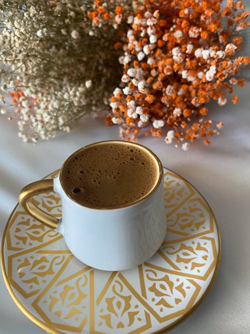 Free White Ceramic Cup of Coffee with Saucer Stock Photo