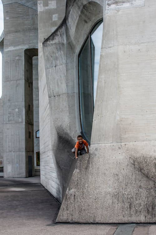 Free A Little Boy Playing outside of the Goetheanum Stock Photo