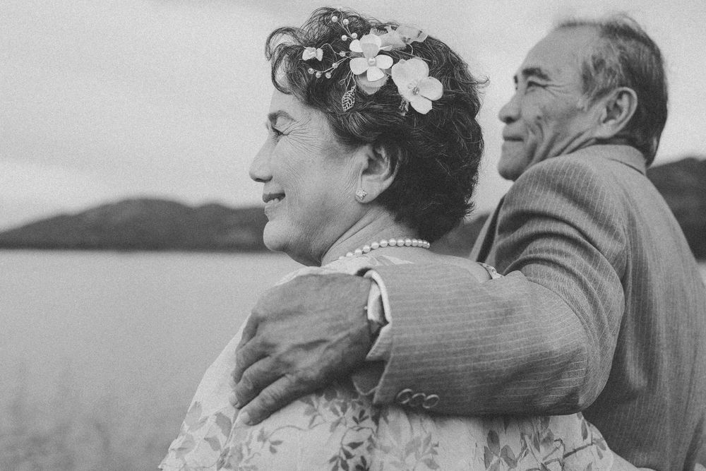 An elderly couple sharing a tender moment