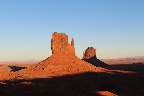 Brown Rock Formations Under Blue Sky