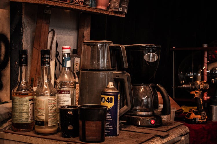 Old Alcohol Bottles And Coffee Makers 