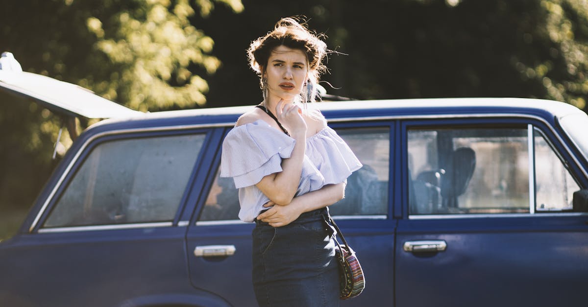 Woman Standing Beside Car Free Stock Photo woman-standing-beside-car-free-stock-photo