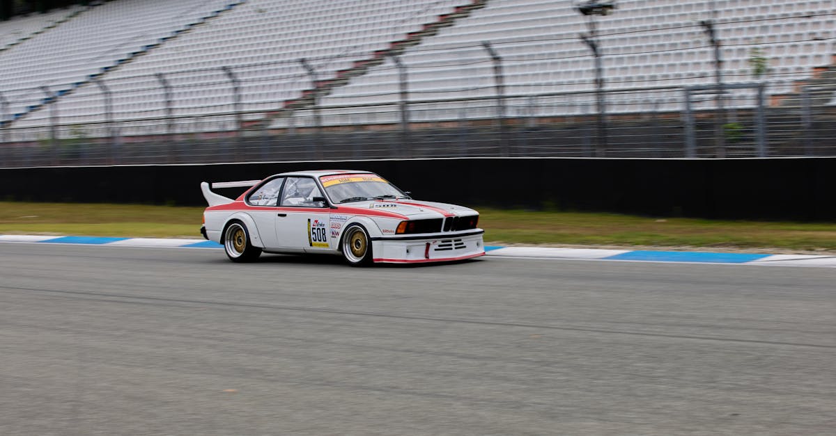 A White BMW on a Race Track · Free Stock Photo