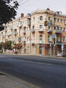 Charming European building facades lining an empty urban street, showcasing classic architecture.