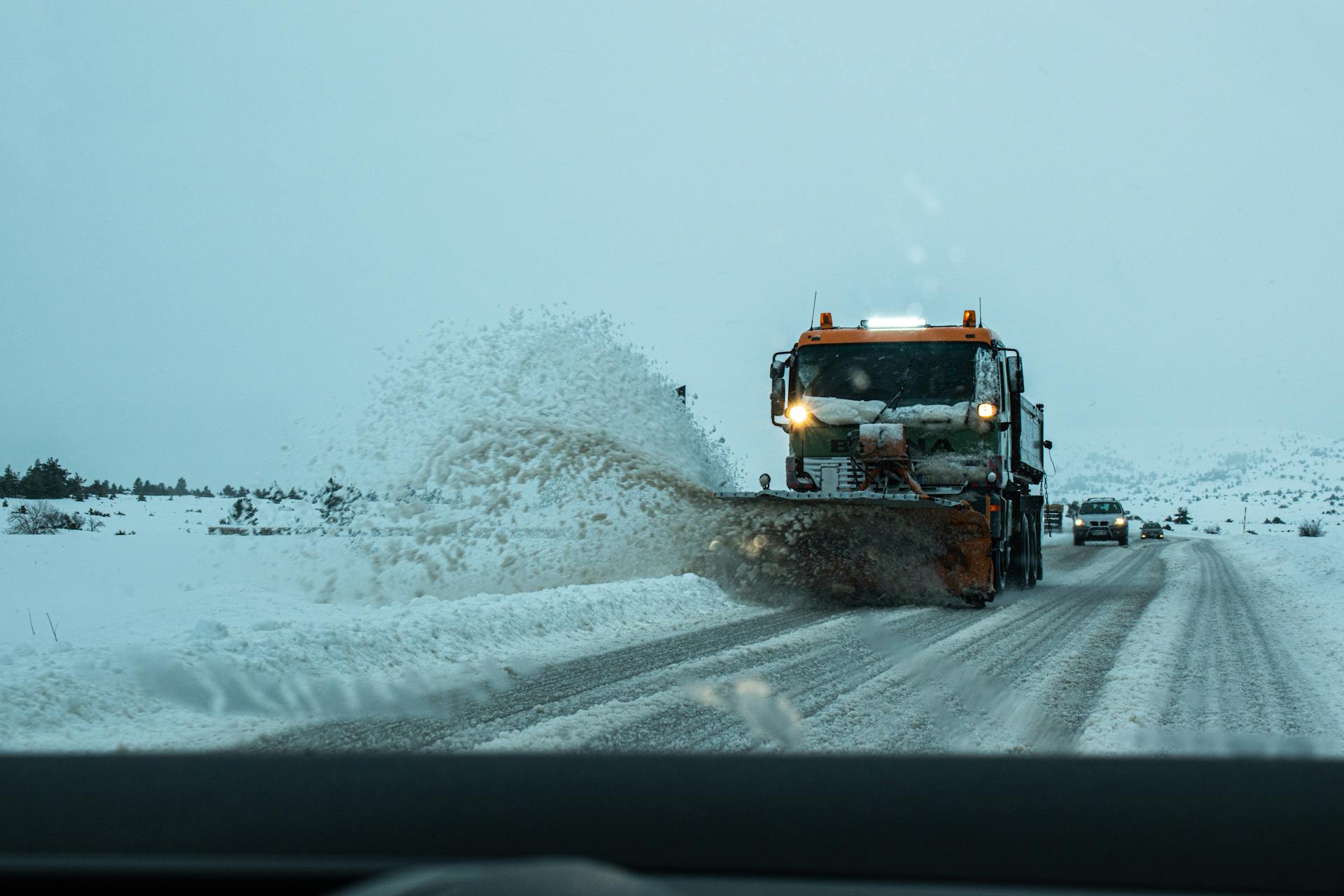 A Snow Plow on a Road