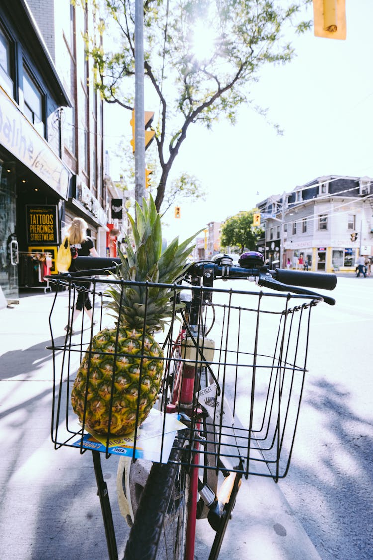 Green Pineapple Fruit In Bicycle Basket