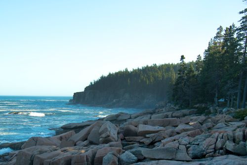 Free Stunning view of the rocky Acadia coastline with ocean waves crashing against the shore at sunrise. Stock Photo