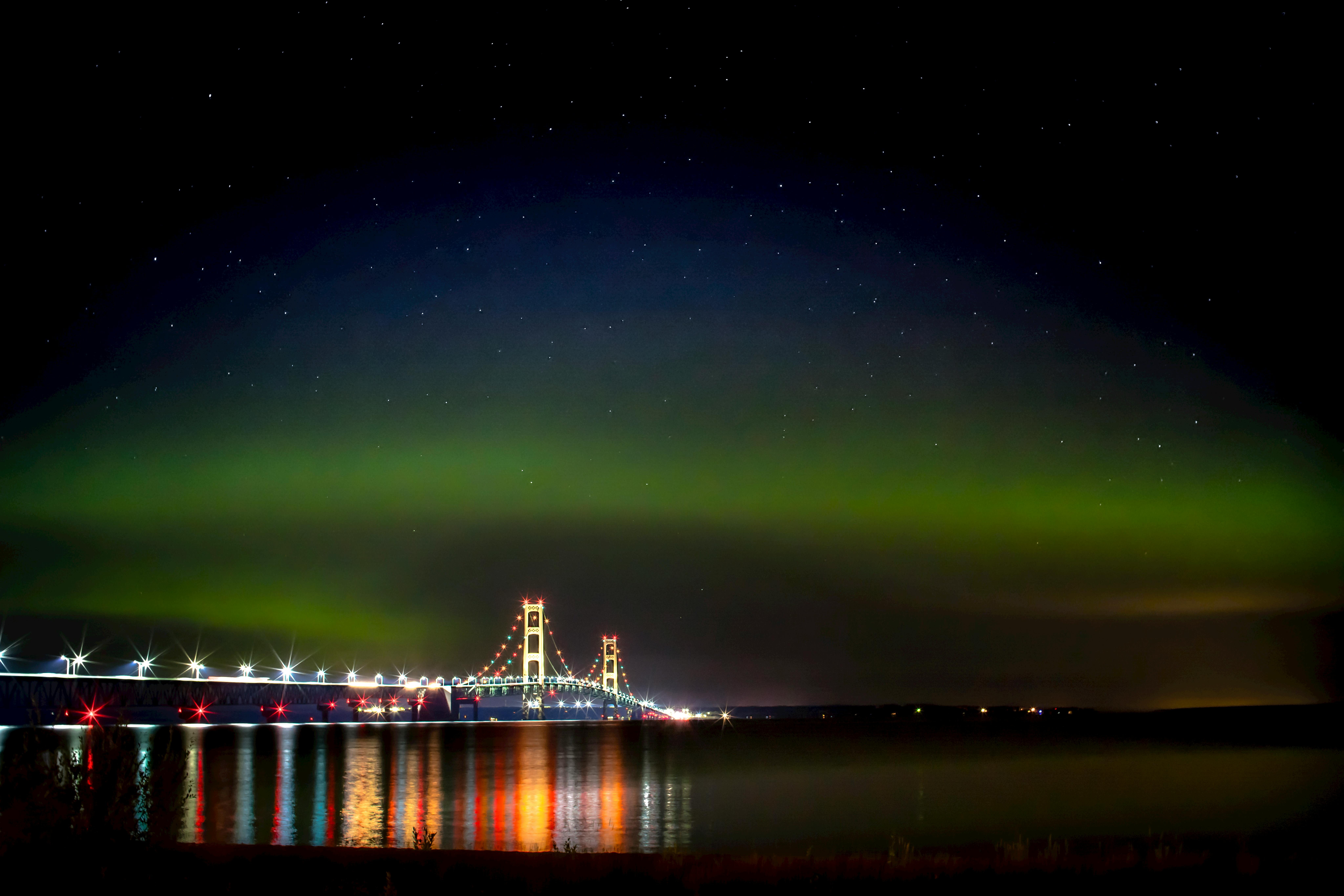 The Mackinac Bridge Under the Northern Lights · Free Stock Photo