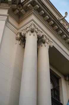 Detail of a classic architectural facade with ornate columns in Concordia, Argentina.