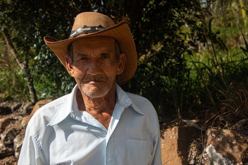 Free Elderly man in cowboy hat, standing outdoors in Los Santos, Colombia. Natural lighting. Stock Photo